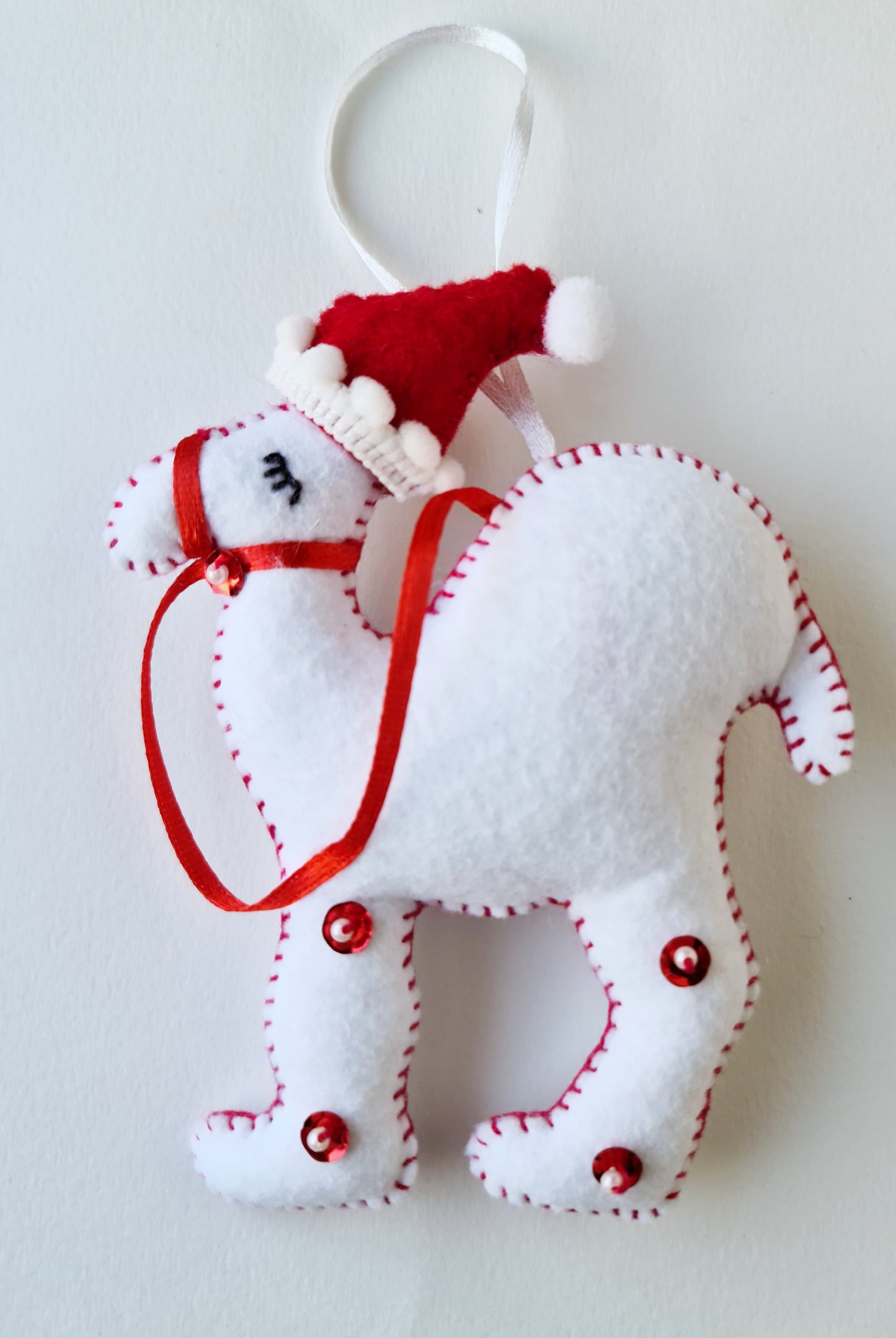 Snow santa hat camel