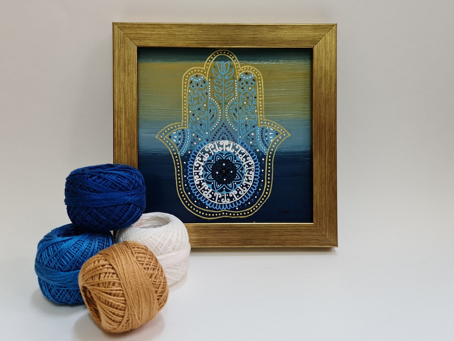 Decorative Hamsa hand on blue and Gold background- [FRAMED - ready to hang]